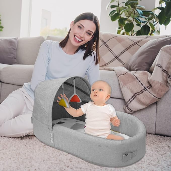 Lulyboo Portable Baby Travel Lounge & Playpen - Indoor/Outdoor Cuddle & Play Baby Bed, Adjustable Backpack, Waterproof, Lightweight, Includes Changing Pads, Plush Toys & Removable Canopy (Metro)