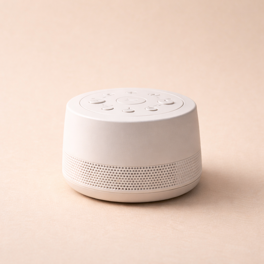 Modern baby white noise machine for infant sleep in minimalist neutral background
