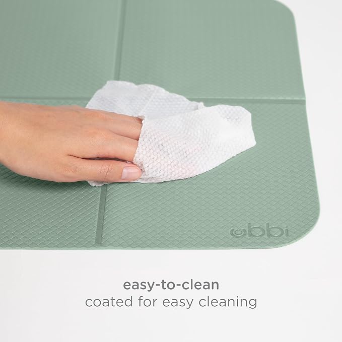 Ubbi On-The-Go Diaper Changing Baby Mat, Soft and Comfortable, Must Have for Newborns, Easy to Clean, Portable Folding Pad, Infant Traveling Accessories, Sage Green, 16" x 21"