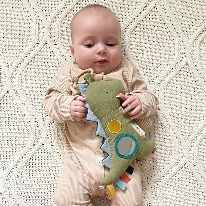 Itzy Ritzy Bitzy Traveler Car Seat & Stroller Toy for Babies – Developmental Sensory Toy Features Crinkle & Rattle Sounds & Multiple Textures –Hanging Travel Toy for On-the-Go Entertainment (Dinosaur)