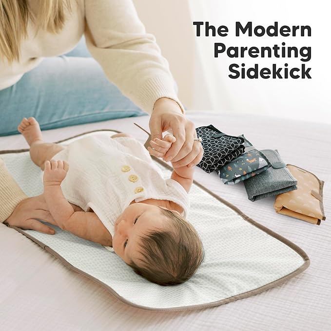 KeaBabies Portable Diaper Changing Pad, Easy Wipe Clean - Foldable Waterproof Baby Changing Mat for Diaper Bag, Compact, Lightweight, 25x13 Newborn, Infant, Baby Changer Travel Essential (Rainbow)