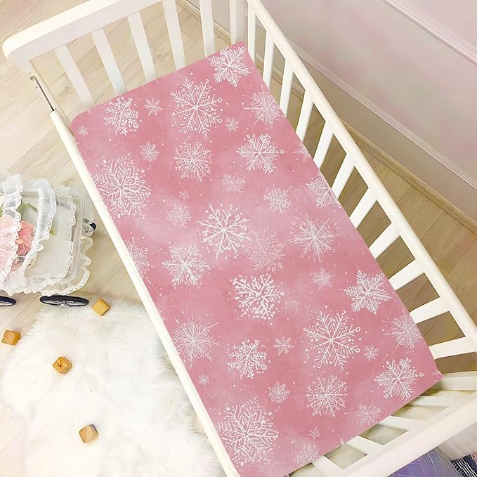 Pfrewn Christmas Crib Sheets for Boys Girls Pink Retro Snowflakes Fitted Crib Sheet for Mini Crib Mattress Stretch Soft Winter Pattern Toddler Baby Playard Sheet,39x27IN