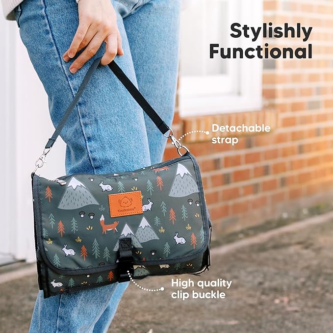 KeaBabies Portable Diaper Changing Pad - Large Waterproof Baby Changing Mat, Compact Travel Diaper Clutch, Functional Pockets Fit Newborn Essentials, Wipeable & Padded Baby Changer (Woods)