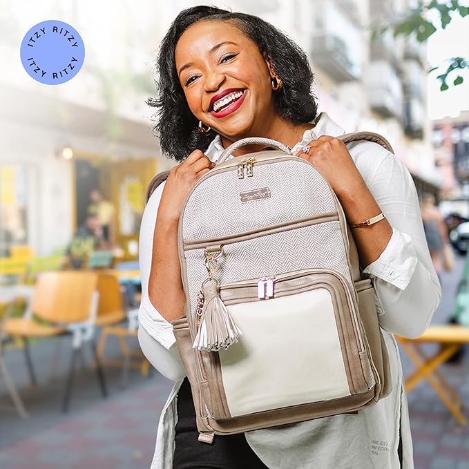 Itzy Ritzy Diaper Bag Backpack – Large Capacity Boss Plus Baby Backpack Diaper Bag Featuring 19 Pockets, Changing Pad, Stroller Clips, and Comfortable Straps (Vanilla Latte)