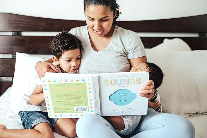 SmartNoggin Baby Developmental Milestones Set: NogginStik Developmental Light-Up Rattle and Baby’s First Book of 44 Sounds with Teether