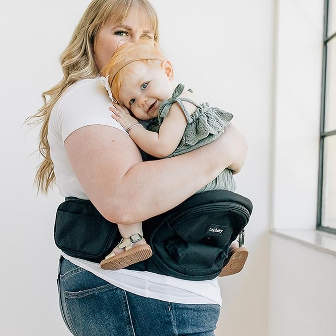 Tushbaby The Original Premium Quality Hip Seat Carrier – Safety-Certified Baby & Toddler Carrier with Secure Safety Buckles, No-Flimsy-Foam Design, Storage Pockets & Nursing Pillow. 0–3 yrs